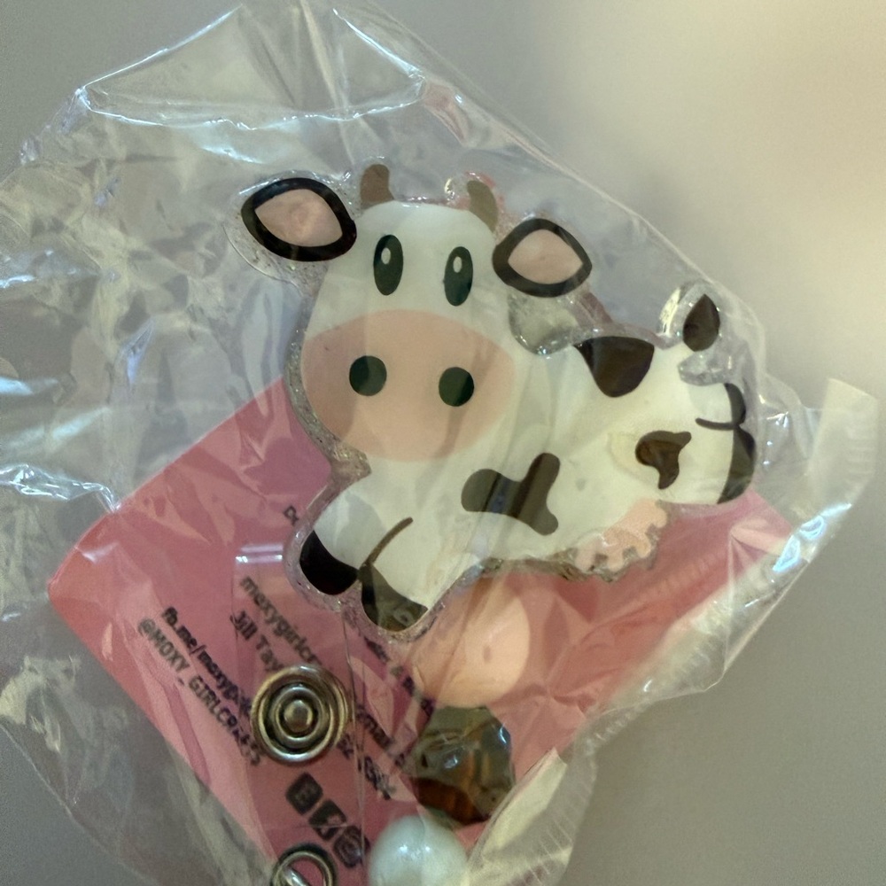 Cow badge reel